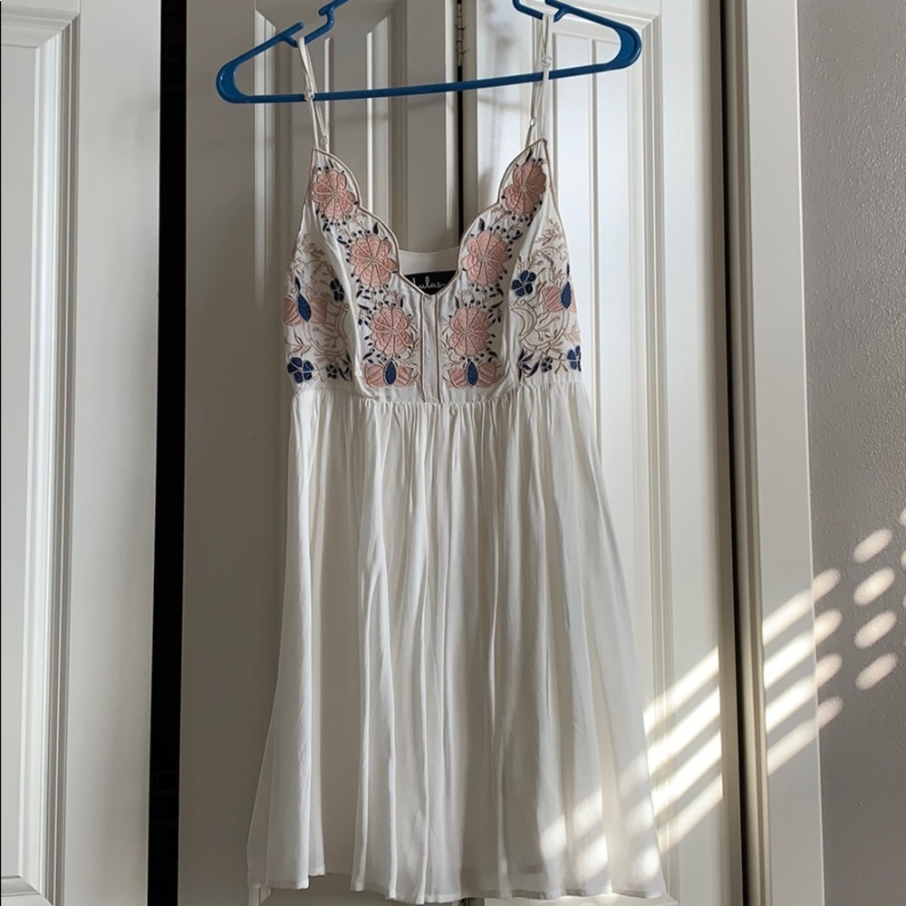 White flowy dress with floral print